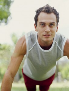 Young Man exercising in a park